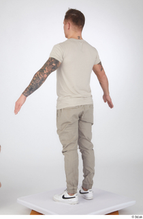 Gilbert a-pose beige t-shirt beige trousers casual dressed standing white…